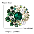 Green emerald rhinestone flower brooch with white pearls in elegant gold alloy finish - Green