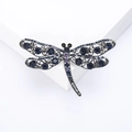 Elegant hollow dragonfly brooch with blue rhinestones and silver alloy vintage design - Blue