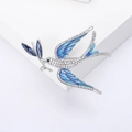 Exquisite swallow brooch with sparkling crystals and blue enamel on a geometric stand - Blue