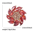Broche fleur rotative élégante en zircon et pierres rouges, taille 2,4 cm et poids 7,8 g - Rouge