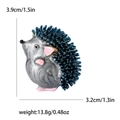 Spilla riccio in smalto blu con dimensioni 3,9x3,2cm e peso di 13,8g mostrati - Blu
