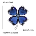 Exquisite four-leaf clover brooch with dark blue heart crystals and silver metal finish - Sapphire Blue
