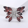 Macro detail of butterfly brooch with deep red crystals and sparkling silver base plating - Purple (MM-BR-3805-PU)