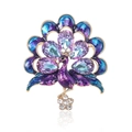Broche paon luxueuse plaquée or avec cristaux violets et détails en émail bleu - Personnage Violet