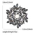 Elegant rhinestone flower wreath brooch featuring smoky grey marquise crystals and metal base - Gray