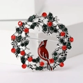 Broche couronne de Noël avec oiseau cardinal et strass rouges et verts brillants - Argenté