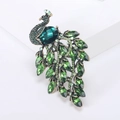 Broche de pavo real vintage verde con cristales esmeralda y brillantes pedrería - Verde