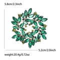 Blumenbrosche mit grünen Steinen, Größe 5,8 cm und einem Gewicht von 20,4 Gramm - Grün