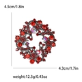 Spilla a ghirlanda con stelle e strass rossi, dimensioni 4,5 cm x 4,3 cm di altezza - Rosso