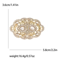 Spilla dorata traforata con strass bianchi e cristalli a goccia con dimensioni incluse - Oro