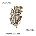 Vintage gouden veren broche met bruine druppel edelsteen en kleine strass-steentjes - Goud