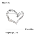 Silver hollow heart brooch with sparkling crystal accents and size measurements - Silver