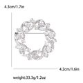 Elegante zilveren krans broche met ingelegde zirkonia en details van de afmetingen - Zilver