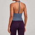 Women's backless gray blue yoga vest and purple high waist leggings set shown from back - S / Grey Blue