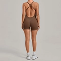 Brown cross back yoga bodysuit with adjustable straps and open back design - Dark Brown