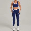 Navy blue two-piece yoga set with white contrast trim and crossover V-waistband leggings - S / Navy Blue