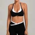 Schwarz-weißer Sport-BH mit Neckholder und passende Leggings mit überkreuztem Bund - S / Schwarz