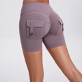 High waist scrunch butt cargo yoga shorts in dusty purple with side buttoned pockets - S / Mulberry Purple