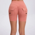 High waist scrunch butt yoga shorts with cargo pockets in coral orange high stretch fabric - S / Coral Orange