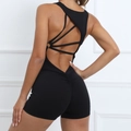 Tuta da yoga nera aderente con schiena scoperta e design arricciato effetto push-up - S / Nero