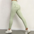 Hoch taillierte hellgrüne Cargo-Yogahose mit Push-Up-Effekt und Seitentaschen - Avocadogrün