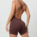 Dark brown backless yoga romper featuring crisscross straps and peach lift tight fit - S / Chocolate