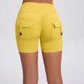 High waist scrunch butt yoga shorts in ginger yellow with decorative back button pockets - S / Sun Yellow