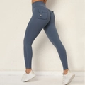 High Waist Yoga-Leggings mit Scrunch-Butt und Seitentaschen in staubblauem Stoff - Code Blau