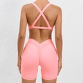 Completo yoga rosa corallo con reggiseno incrociato e pantaloncini sportivi push-up - S / Pesca Selvatica