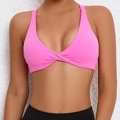 Hot pink racerback sports bra with twist-knot front and stretchy fitness fabric - Fluorescent Pink