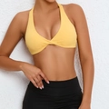 Bright yellow halter yoga bra with front twist detail and cross back sports design - Yellow