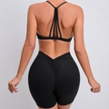 Black yoga set with multi-strap bra and high-waisted scrunch butt shorts for fitness - Black