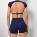 Rückansicht des dunkelblauen Yoga-Sets mit offenem Rücken und hoher Taille Shorts - Marineblau
