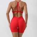 Women's quick-dry red yoga set with cross-strap sports bra and scrunch butt shorts - Red