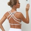 White quick-dry yoga sports bra featuring a stylish multi-strap criss-cross back design - White