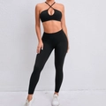 Two-piece black yoga set with cross-back sports bra and high-waisted leggings - S / Black