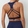 Reggiseno sportivo blu scuro con spalline incrociate e leggings yoga coordinati - S / Blu navy