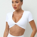 Short sleeve white yoga crop top featuring a twist front design and a deep V-neckline - S / Tops / White