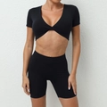 Women's black 2-piece yoga set with V-neck twist crop top and high waist cycling shorts - S / Black