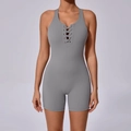Body de yoga gris avec bretelles croisées, design galbant et détails d'œillets métalliques - Gris foncé