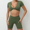 Olive green two-piece yoga set with V-neck twist top and high waist biker shorts - S / Army Green