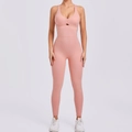 Women's cross back yoga bodysuit in soft coral pink with peach lifting effect - Dusty Pink