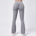 Rear view of high-waisted gray yoga flare pants with scrunch butt lifting detail - S / Bottoms / Dark Gray