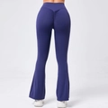 Detail of high waisted dark blue flare yoga pants showing scrunch butt lifting effect - S / Bottoms / Navy Blue