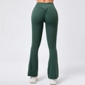 Detail of high waisted dark green flare yoga pants with scrunch butt lifting design - S / Bottoms / Dark Green
