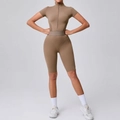 Mocha slim fit yoga bodysuit featuring a front half-zipper, short sleeves, and biker length - S / Top And Bottom / Mocha Brown