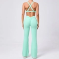 Mintgroene yogaset met sportbeha met kruisbandjes en uitlopende legging met hoge taille - L / Licht Smaragdgroen