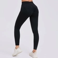 Leggings da yoga neri a vita alta con effetto scrunch push-up e tasche laterali - S / Nero