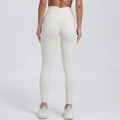 Leggings yoga a vita alta scrunch butt bianco crema con tasche decorative posteriori - S / Beige
