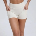 Women's high-waisted fitness shorts in beige with side pockets and V-back design - Beige